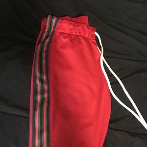 EPTM red and green track pants SZ M